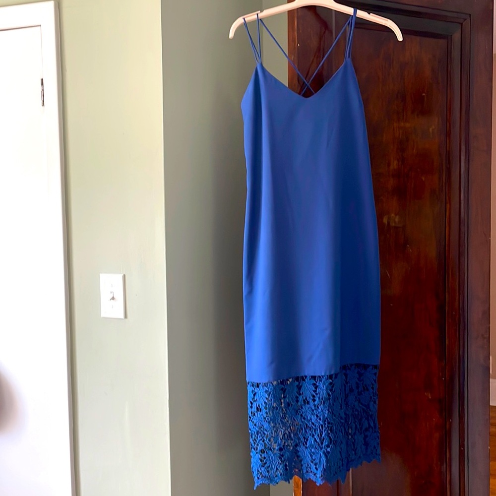 Blue cocktail dress with fun lace hem